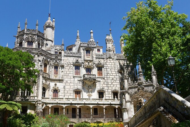 Close-up of the Initiation Well at Quinta da Regaleira, with a spiral staircase descending into the earth, showcasing its architectural design and symbolic associations with the Knights Templar and Freemasonry.