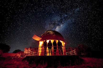 The Atacama Desert night sky with the Milky Way stretching across the horizon, showcasing its unparalleled stargazing conditions.
