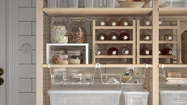 Open shelving used for practical storage in a modern home