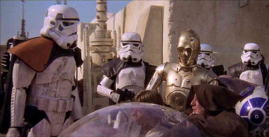 A dramatic shot of a bounty hunter standing triumphantly over their defeated target.