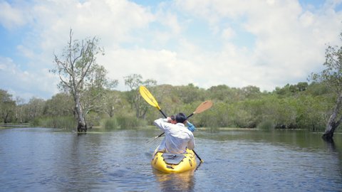 Divers exploring vibrant coral reefs in Raja Ampat, Indonesia