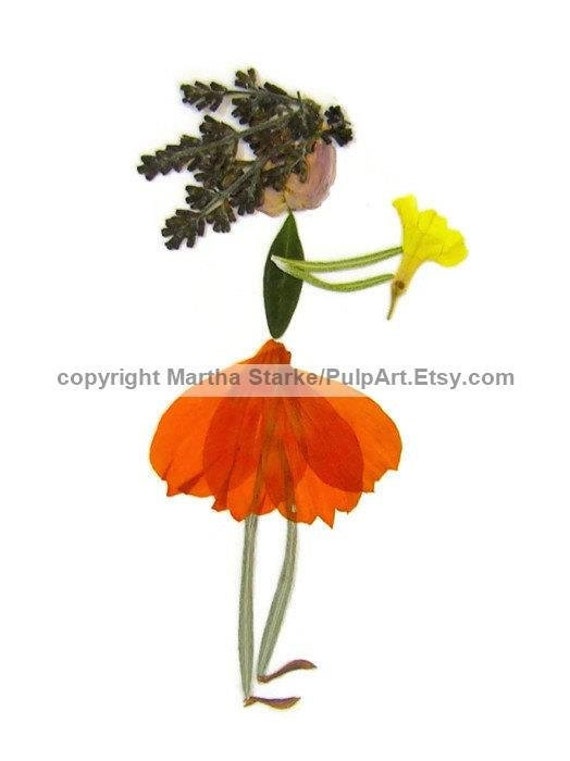 Image of pressed flowers on a linen background.