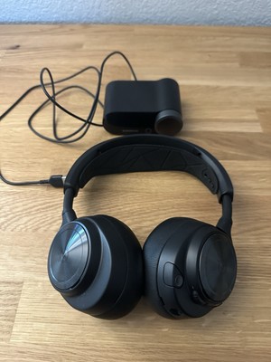 Someone wearing the SteelSeries Arctis Nova Pro Wireless during an intense gaming session, showcasing comfort and fit.