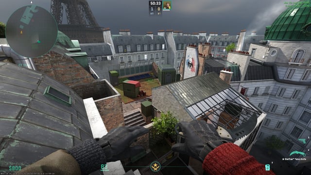 A first-person perspective image showing a hand interacting with a complex interface, implying immersive gameplay mechanics.