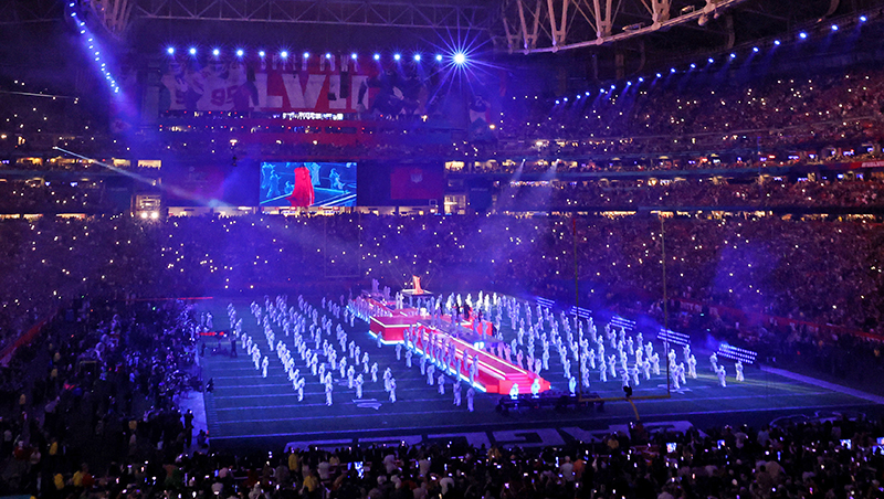 Image showcasing the costume designs of Beyoncé's dancers, highlighting the angular and triangular elements that contribute to the pyramid shapes. Contrasting textures of sequins and matte fabrics add visual interest.