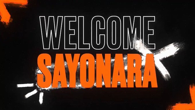 A player intensely focused on a Valorant match. The screen reflects in their glasses, highlighting the concentration and pressure of competitive gaming.