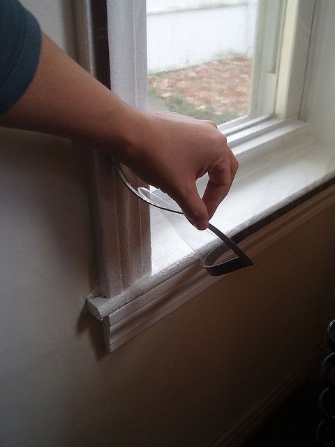 DIY window insulation reducing heat loss