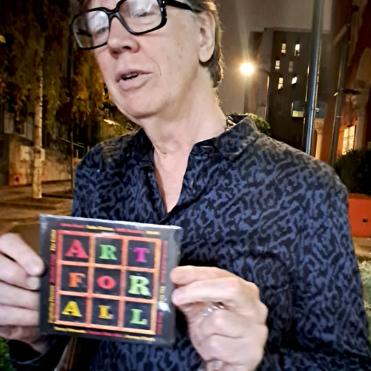 Screenshot from Hyper Light Breaker depicting a character battling enemies in a muted, open-world setting. The image underscores the perceived downgrade in visual fidelity and the absence of the distinct atmosphere that defined Hyper Light Drifter.