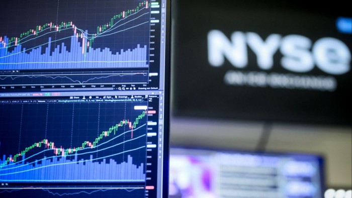 Investor relations documents on a screen