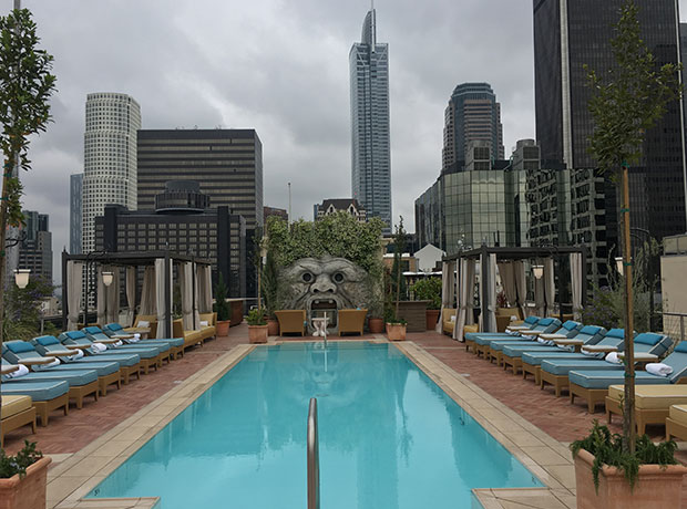 The NoMad Los Angeles lobby featuring gilded ceilings and plush seating