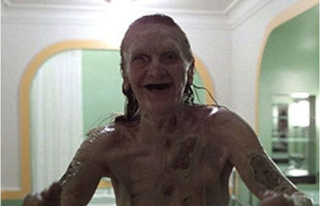 The infamous bathtub scene from Room 237, with the spectral woman, symbolizing the decaying truth or the alluring deception surrounding the alleged moon landing hoax.