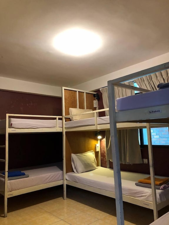 Angkor Backpacker Palace faded sign