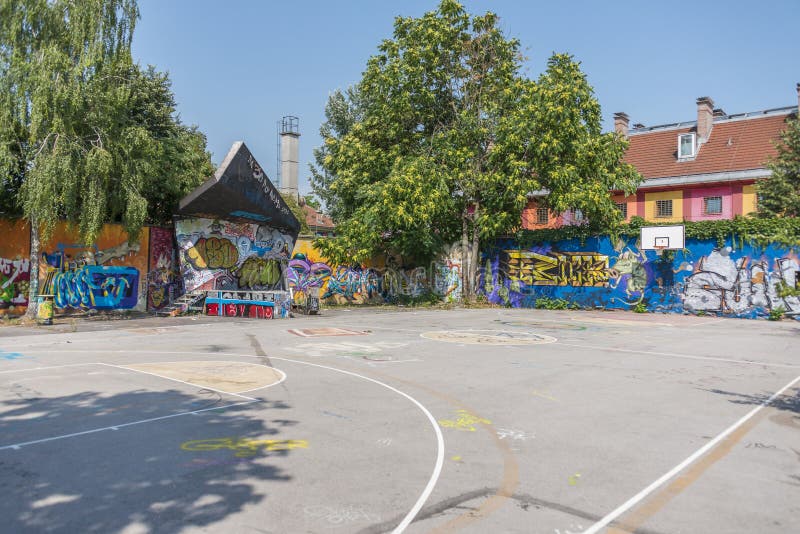 Lake Bled with its iconic island church, surrounded by mountains and forests, as seen from a viewpoint