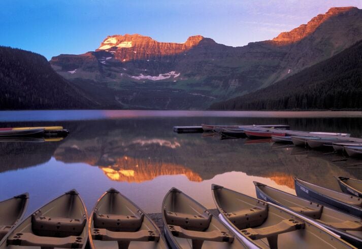 Joe Running Crane guiding a photography group in Glacier National Park