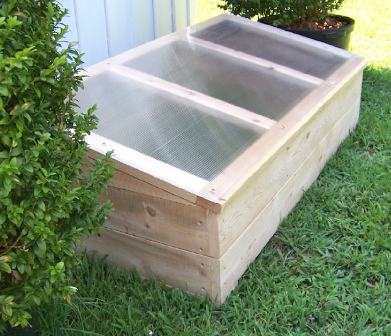 Wooden cold frame.