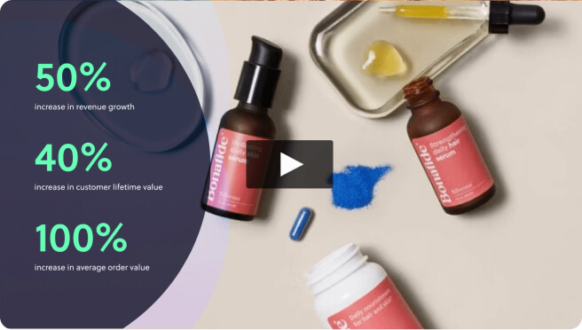 A person smiling and holding a personalized subscription box, illustrating the positive customer experience and brand loyalty.