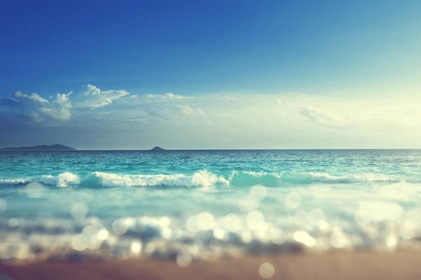 Churros being dipped in chocolate