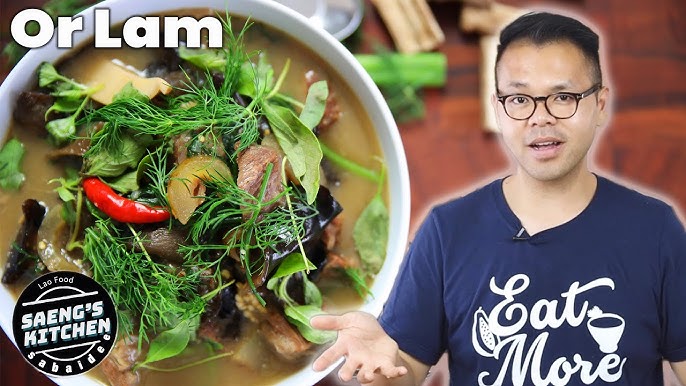 A close-up of monks participating in the Tak Bat ceremony