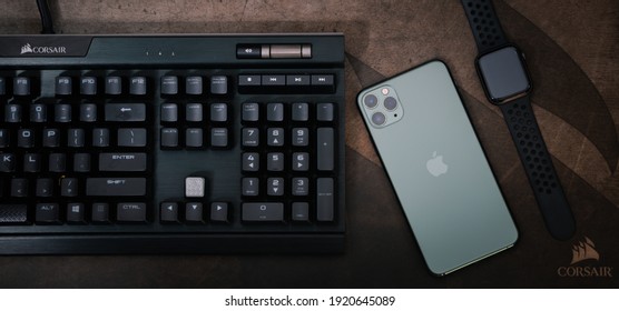 Clean, professional shot of the assembled PC build inside the Phanteks NV5 case, showcasing cable management and the overall aesthetic. Focus on the tempered glass side panel, with internal components illuminated by subtle RGB lighting.