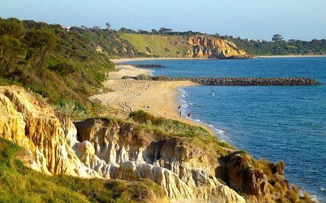 A close-up shot of intricate ice formations inside one of the Apostle Islands ice caves.