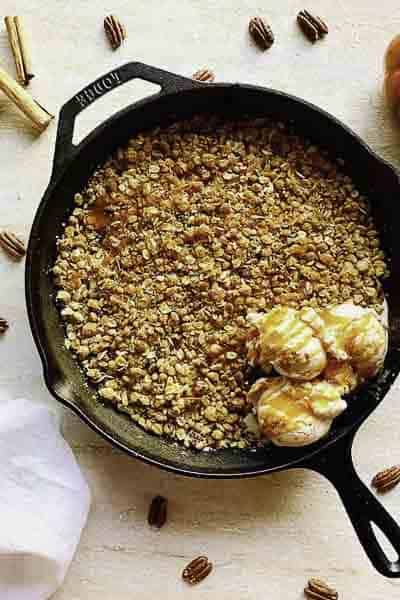 Golden brown apple crisp being served