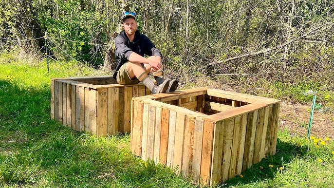 Assembling the frame of a raised garden bed using reclaimed wood.