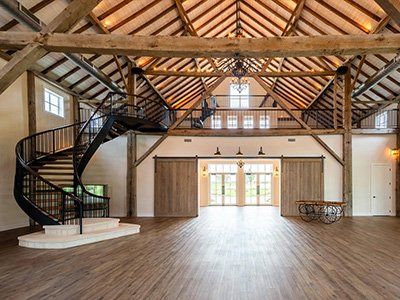 stack weathered reclaimed wood barn interior