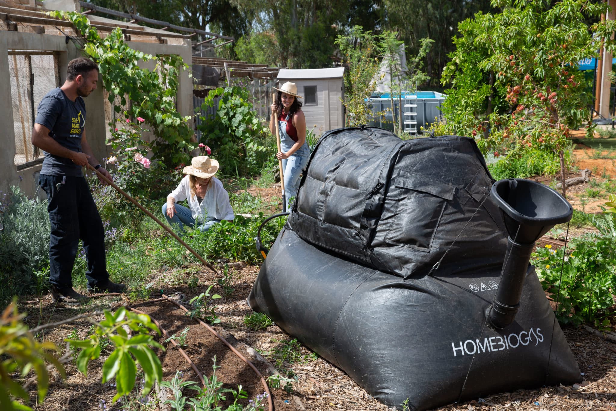 A series of photos demonstrating the steps of building a DIY digester. 