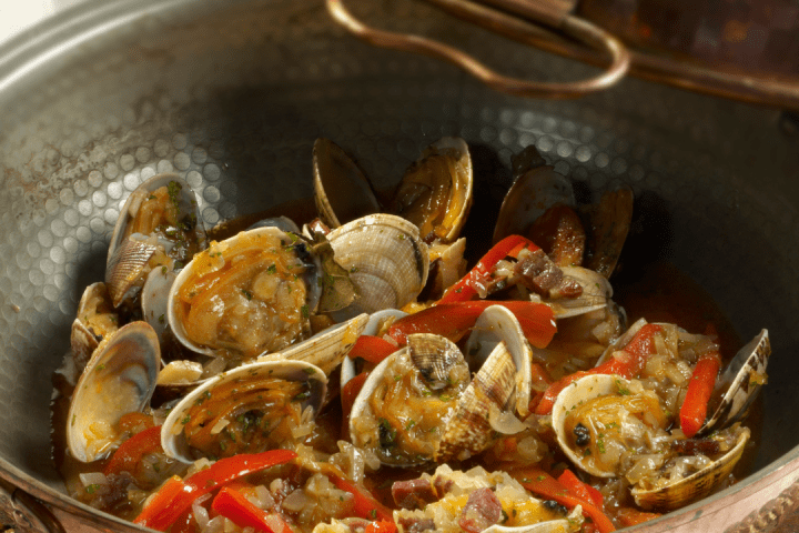 Rooftop terrace view with the Ponte 25 de Abril bridge in the background