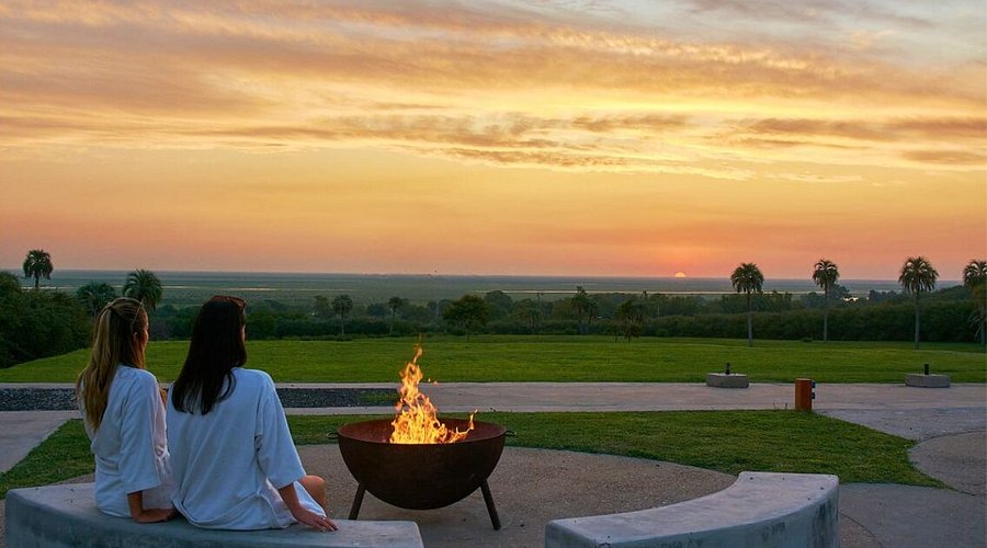 Couple Toasting on the Balcony at The Betsy Hotel
