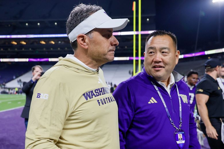 David Moreau, the head of Pixel Forge Games, in front of his computer. The computer shows lines of code from the Unity Engine.