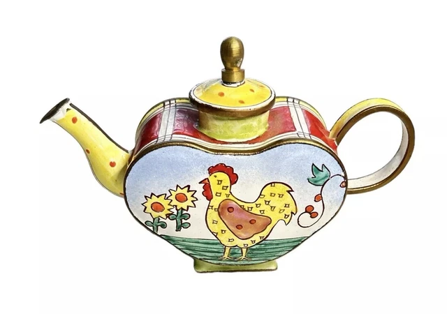 thrifted enamel teapot chipped paint rustic shelf