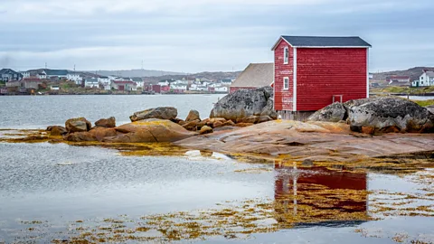 David Chen participating in the woodworking workshop with Gerald Squires.