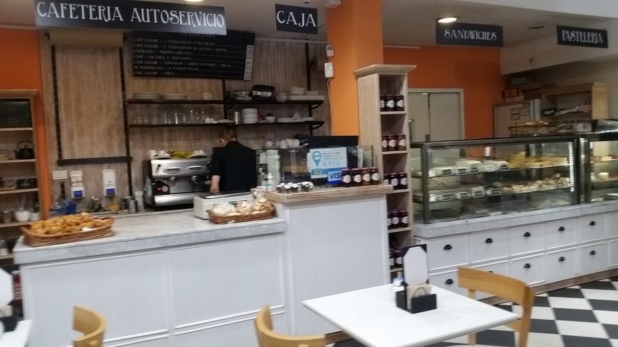 A stack of medialunas with a glistening glaze