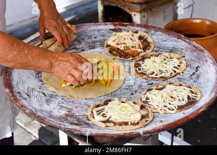 ## Oaxaca's Culinary Heart: Tlayudas, Mole Negro,...