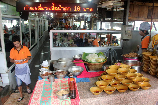 Bowls of Boat Noodles stacked high on a table