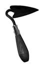 adding compost garden soil trowel