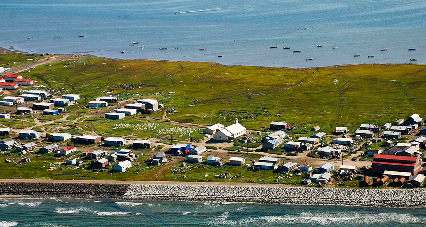 Anya Sharma, travel writer, riding a horse on the beach at sunset