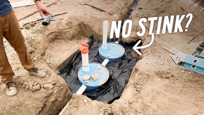 Image: Drilling holes in the PVC pipe for water distribution.