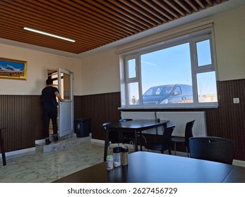 Nomadic Mongolian Family Sharing a Meal in Their Yurt