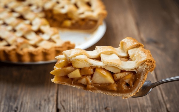 an apple pie baked and ready to be served
