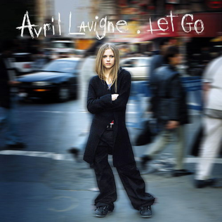 Close-up of Avril Lavigne's ear shape pre and post 2003