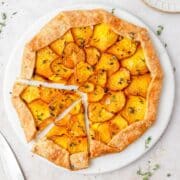 Slice beet tart, side-view, flaky crust