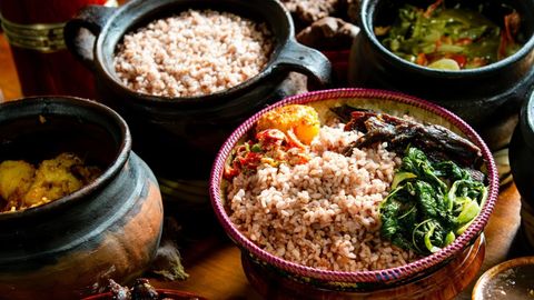 Elsie interviewing a local artisan in a remote village supported by World Expeditions, showcasing the commitment to community-based tourism.