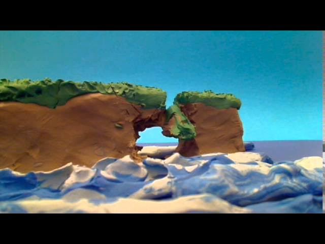 Hexagonal basalt columns of the Giant's Causeway, Northern Ireland, extending into the sea.