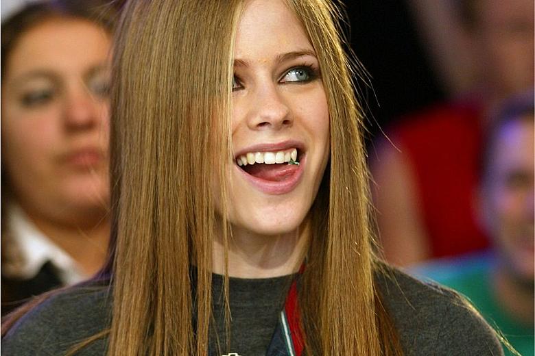Montage of TikTok videos discussing the Avril Lavigne conspiracy, showcasing the duet feature and visual comparisons used to spread the theory.