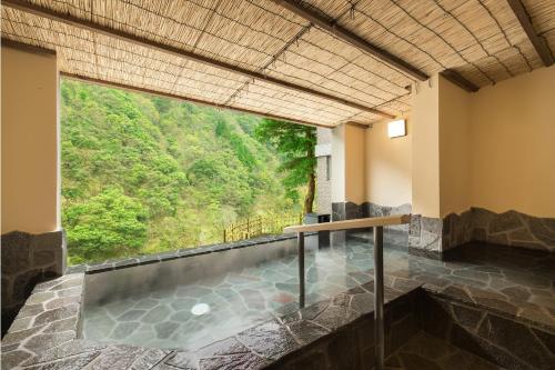 A snowshoer silhouetted against the backdrop of the icy Okhotsk Sea
