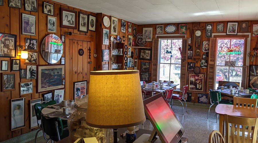 Raspberry Island Lighthouse at sunset with colorful sky