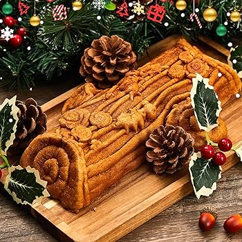 Moss being added to the Yule Log
