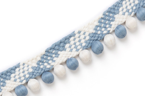 An example of local craftsmanship, showing intricate knitting patterns with detail, focus on texture and colour.